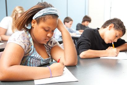 Students writing an exam.